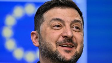 Ukraine's President Volodymyr Zelensky reacts as he speaks during a press conference as part of the European Council meeting in Brussels on December 18, 2025. European Unions leaders meet in Brussels on December 18 and 19, 2025, to discuss in particular the need to support Ukraine, transatlantic relations and the EU's strategic autonomy.
JOHN THYS / AFP