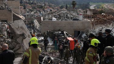 Israeli emergency services secure the scene of a missile attack near Bet Shemesh, some 30 kilometres west of Jerusalem on March 1, 2026.  Israeli emergency services announced that several people were injured on March 1, in the Bet Shemesh area (centre) after further Iranian missile strikes, the day after the US and Israel attacked Iran and assassinated its supreme leader.
AHMAD GHARABLI / AFP