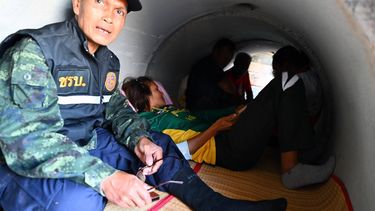 epa12577977 Thai villagers take shelter under a concrete bunker following clashes between Thai and Cambodian troops in Phanom Dong Rak district, Surin province, Thailand, 08 December 2025. The Royal Thai Army has reported a Thai soldier was killed and other eight wounded in the multiple border area clashes between Thai and Cambodian troops after Cambodian troops attacked in the Phu Pha Lek hill of Phlan Hin Paet Kon area in Kantharalak district, Si Sa Ket province that prompted the evacuation of residents in four northeastern provinces bordering Cambodia, according to Thai Army spokesman Major General Winthai Suvaree.  EPA/KAIKUNGWON DUANJUMROON