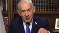 This grab from handout video released by Israel's Government Press Office (GPO) shows Prime Minister Benjamin Netnayahu giving a televised address from his office in Jerusalem on February 28, 2026. Netanyahu said on February 28 that Iran must not be allowed to gain nuclear arms urging Israelis to 