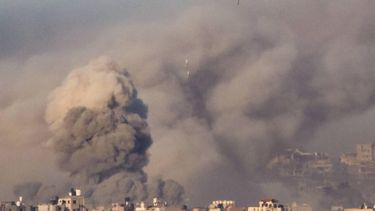 This picture taken from southern Israel near the border with the Gaza Strip shows smoke billowing as bombs drop during an Israeli strike in north Gaza on November 22, 2023, amid ongoing battles between Israel and the Palestinian Hamas movement. 
JACK GUEZ / AFP