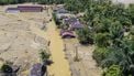 This picture shows an aerial view of villagers wading through the mudflow to find a shelter in the aftermath of flash floods in Tukka village, Central Tapanuli, North Sumatra province, on December 3, 2025. Officials in Indonesia and Sri Lanka battled on December 3 to reach survivors of deadly flooding in remote, cut-off regions as the toll in the disaster that hit four countries topped 1,300. In Indonesia, there is growing frustration among survivors of catastrophic flooding and landslides over the pace of the rescue effort and aid delivery.
YT Hariono / AFP