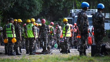Memebers of the Nepali army prepare to leave on rescue missions following devastating landslides, at Trishuli camp, in Nepal's Nuwakot district on August 28, 2026. China and Nepal warned of fresh flooding risks, complicating rescuers' search for more than 1,400 people missing after a deadly deluge and landslides swept away entire villages along their remote Himalayan border.
Arun SANKAR / AFP