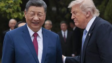US President Donald Trump (R) speaks with China’s President Xi Jinping as he leaves after a visit to Zhongnanhai Garden in Beijing on May 15, 2026. 
Evan Vucci / POOL / AFP