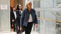 President of the parliamentary group of the French far-right Rassemblement National (RN) party, Marine Le Pen (R), walks followed by co-defendant French member of European Parliament Catherine Griset (L) as they exit a courtroom while leaving the Tribunal de Paris courthouse during the reading of sentencing in their trial verdict on suspicion of embezzlement of European public funds, in Paris, on March 31, 2025. A French court on March 31, 2025 convicted far-right leader Marine Le Pen on charges of embezzlement of public funds over a fake jobs scam at the EU parliament, and has banned her from running for office after conviction. 

ALAIN JOCARD / AFP
