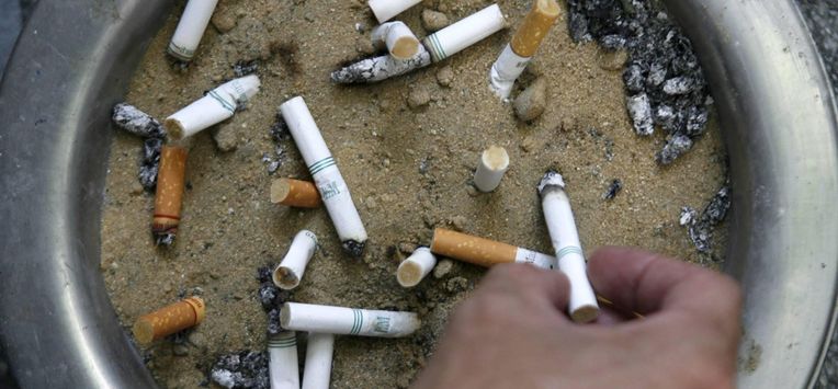 epa01022487 An ashtray full of cigarette butts in a designated smoking area at an office building in Bangkok, Thailand, 29 May 2007. On Thursday 31 May, World No Tobacco Day is held, sponsored annually by the World Health Organization to call attention to the danger of smoking. This year the day is focused on secondhand smoke, promoting 100% smoke-free environments, especially workplaces and public spaces, as the only effective way to protect people everywhere from exposure to second-hand tobacco smoke. Smoking is the second major cause of death in the world. Thai smoker numbers have fallen by nearly 40 percent over the past 20 years and the government is moving further to enforce more severe anti smoking laws. In the United States alone, tobacco is reported to cause one in every five deaths  EPA/BARBARA WALTON