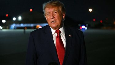 US President Donald Trump speaks with reporters after landing at Joint Base Andrews, Maryland, upon his return from Ohio where he attended the Patriot Games finals, on August 11, 2026. 
Jim WATSON / AFP