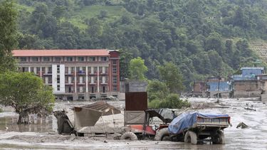 epa13193015 Floodwaters sweep through Trishuli Bazar following a flash flood, in Nuwakot district, Nepal, 26 August 2026. Several people were killed and multiple others were reported missing after a massive flash flood swept through Rasuwa and Nuwakot districts causing widespread destruction to settlements and infrastructure, according to local authorities.  EPA/NARENDRA SHRESTHA