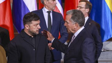 epa12594704 Ukrainian President Volodymyr Zelensky (L) speaks with US Special Envoy Steve Witkoff (R) as they take part in a family picture at the Chancellery in Berlin, Germany, 15 December 2025. Berlin hosts US-Ukraine negotiations on a proposed peace plan, including a possible ceasefire in Ukraine, and a broader multilateral summit with key European leaders.  EPA/CLEMENS BILAN / POOL