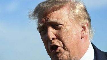 US President Donald Trump talk to members of the press as he arrives at Chicago O'Hare International Airport in Chicago on September 27, 2026. Trump is in Chicago to attend the President's Cup closing ceremony.
Jim WATSON / AFP