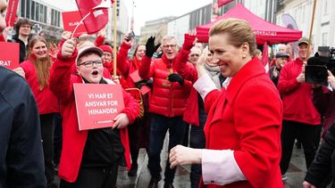 epa12846080 Denmark's Prime Minister and Social Democrats leader Mette Frederiksen (R) greets people on election day on the street at Nytorv in Aalborg, Denmark, 24 March 2026.  EPA/Henning Bagger  DENMARK OUT