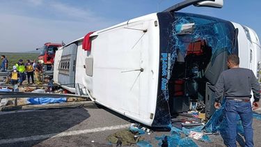 This handout photograph taken and released on October 11, 2026 by Turkish news agency DHA (Demiroren News Agency) shows fire department and first aid officials operating at the site of a crashed bus following the collision of a tour bus and a lorry in Manisa, west of Turkey. A Tour bus and a lorry have collided on October 11, 2026, in Manisa, leaving 11 dead and 27 injured people Manisa Governorship reported. 
Handout / DHA (Demiroren News Agency) / AFP