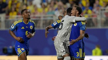 Curacao's goalkeeper #25 Tyrick Bodak celebrates with Curacao's defender #03 Jurien Gaari at the end of the 2026 World Cup Group E football match between Ecuador and Curacao at the Kansas City Stadium in Kansas City on June 20, 2026. 

JUAN MABROMATA / AFP