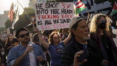 A person holds up a sign during a protest in Los Angeles, California on January 10, 2026 against US Immigration and Customs Enforcement (ICE) after the fatal shooting of Renee Nicole Good in Minneapolis. A US Immigration and Customs Enforcement (ICE) agent shot and killed 37-year-old Renee Nicole Good on the streets of Minneapolis on January 7, leading to huge protests and outrage from local leaders who rejected White House claims she was a domestic terrorist.
ETIENNE LAURENT / AFP
