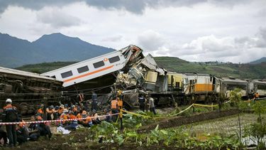 Search and rescue teams work at the scene of a train accident in Cicalengka, West Java province on January 5, 2024. Three people were killed and at least 28 injured when two trains collided on Indonesia's main island of Java on January 5, officials said.
ADI MARSIELA / AFP