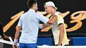 epa11075971 Novak Djokovic of Serbia (left) shakes hands with Dino Prizmic of Croatia after defeating him in their first round match on Day 1 of the 2024 Australian Open at Melbourne Park in Melbourne, Australia, 14 January 2024.  EPA/LUKAS COCH AUSTRALIA AND NEW ZEALAND OUT