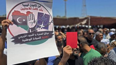 Libyans take part in a demonstration in front of the UNHCR office in Tripoli on June 4, 2026, demanding the departure and closure of the UNHCR offices and declaring 'No to foreign settlement in Libya'. 
Mahmud Turkia / AFP