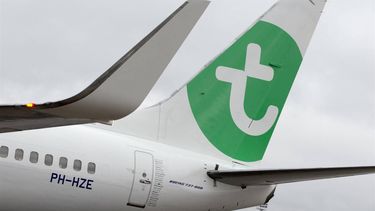 A Boeing 737-800 aircraft of low-cost airliner Transavia, a subsidiary of French commercial jet liner Air France features on January 26, 2015 the new color and logo of the company at Paris-Orly airport in Orly. AFP PHOTO / KENZO TRIBOUILLARD
KENZO TRIBOUILLARD / AFP