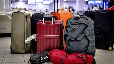 Herfstvakantie, vakantie, reizen, schiphol, koffers, bagage, vliegveld, luchthaven