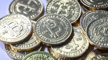 epa12891655 Bitcoin logos are seen during the Blockchain Forum 2026 in Moscow, Russia, 15 April 2026 The Blockchain Forum is the largest crypto forum and exhibition on Web3, mining, cryptocurrency, and AI. More than 20,000 participants, including founders and top managers of leading global companies, investors, developers, and industry leaders, attend the forum.  EPA/MAXIM SHIPENKOV