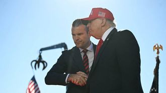 US President Donald Trump (R) shakes hands with Secretary of Defense Pete Hegseth as he arrives to speak at Anduril Industries in Sparrows Point, Maryland, on October 6, 2026. 
Jim WATSON / AFP