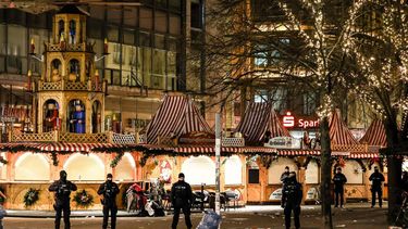 epa11787804 Police officers patrol at the scene after a car was driven into a crowd at the Christmas market in Magdeburg, Germany, early 21 December 2024. According to statements by the Magdeburg police on social media, two people were dead, several people were injured, and a suspect was taken into custody.  EPA/FILIP SINGER