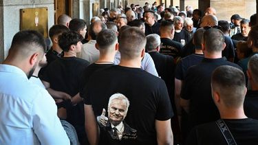 A mourner wears a shirt with the image of late Bosnian Serb military leader Ratko Mladic during a military commemoration for Mladic at the House of the Serbian Army in Belgrade, on September 5 2026. Former military members and relatives attended the commemoration two days ahead the funeral of convicted Bosnian Serb war criminal Ratko Mladic in the Serbian capital.
OLIVER BUNIC / AFP