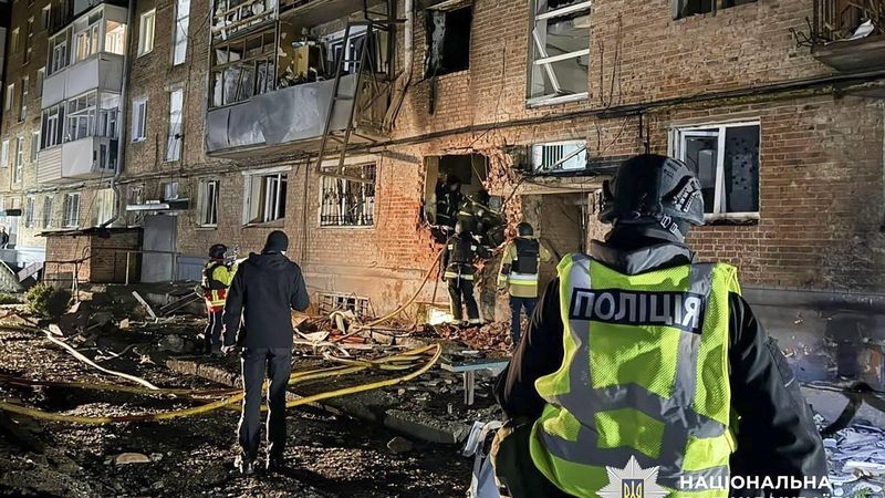 epa12882143 A handout photo made available by the National Police of Ukraine shows Ukrainian rescuers working at the site of a Russian drone strike on a residential area in Sumy, Ukraine, 11 April 2026, amid the ongoing Russian invasion. At least 17 people, including one child, were injured in the overnight attack in Sumy, according to a National Police of Ukraine report.  EPA/NATIONAL POLICE OF UKRAINE/HANDOUT  HANDOUT EDITORIAL USE ONLY/NO SALES