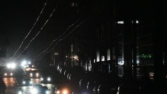 Cars drive in a dark street during a blackout in Kyiv on October 8, 2026, amid the Russian invasion in Ukraine. The Kyiv City State Administration said reduced voltage in the power grid had forced the temporary suspension of some public transport services in the capital.
Sergei SUPINSKY / AFP