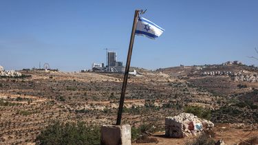 An Israeli flag installed by the settlers is pictured in the al-Tireh neighbourhood at the western entrance to Ramallah, in the Israeli-occupied West Bank on September 27, 2026. Israel has occupied the West Bank since 1967 and violence there has surged since Hamas's October 7, 2023 attack on Israel which sparked the Gaza war.
Zain JAAFAR / AFP