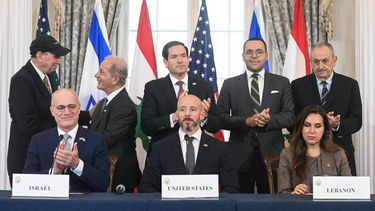 US Secretary of State Marco Rubio (C, back) applauds as he hosts a signing ceremony with Israeli Ambassador to the US Yechiel Leiter (L, front row), and Lebanese Ambassador to the US Nada Hamadeh (R, front row) at the US Department of State in Washington, DC, on June 26, 2026.  Lebanon, Israel and the United States on Friday signed a trilateral framework agreement aimed at paving the way for a peace deal between the two long-time Middle East adversaries.

SAUL LOEB / AFP