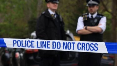 Police officers stand on duty at a cordon near to the Finchley Reform Synagogue, in the North Finchley area of north London, on April 15, 2026, following an attack on the synagogue in the early hours of the morning. Britain's Metropolitan Police said on April 15 they are seeking two suspects following an attempted arson attack at Finchley Reform Synagogue in north London, where bottles thought to have  contained petrol were thrown at the building.
Toby Shepheard / AFP