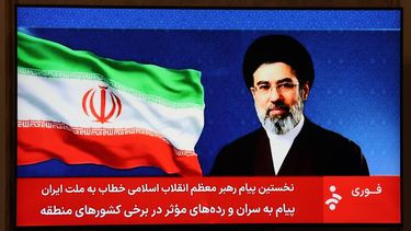 epa12814143 An image of Iranian supreme leader Ayatollah Mojtaba Khamenei shown on Iranian State Television, as a presenter reads his first address to the nation in Tehran, Iran, 12 March 2026. Iran will keep blocking the Strait of Hormuz, according to the statement attributed to the new supreme leader, who has not been seen in public since succeeding his father.  EPA/ABEDIN TAHERKENAREH