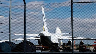 epa13153515 A Ukrainian 'Antonov' cargo plane is pictured behind a security fence at the Airport Leipzig-Halle, in Schkeuditz, Germany, 06 August 2026. German police issued an alert at the airport after a drone loaded with explosives was found near a Ukrainian cargo plane, and another aircraft had collided with an unidentified flying object nearby shortly before landing safely. The airport in eastern Germany plays a key role in the transport of military supplies by the German Armed Forces and NATO allies. It also serves as a base for the Ukrainian airline Antonov Airlines.  EPA/FILIP SINGER