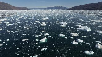 This photograph taken on August 15, 2023, shows water melting from an iceberg in Scoresby Fjord, Greenland.  The French National Centre for Scientific Research (CNRS) is undertaking an expedition to explore Greenland's isolated fjords, the planet's largest fjord system, which remains vastly understudied. The expedition, arranged by the volunteer-run French initiative Greenlandia, is dedicated to understanding the climate change's effects on Scoresby Fjord and its inhabitants.
Olivier MORIN / AFP