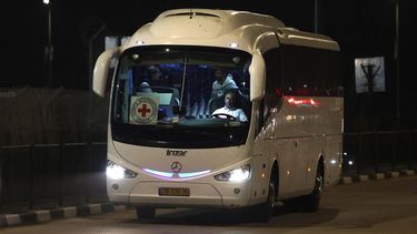 A Red Cross bus and delegation arrive outside the Israeli Ofer military prison located between Ramallah and Beitunia in the occupied West Bank on November 30, 2023, ahead of the release of Palestinians in exchange for Israeli hostages held by Hamas in Gaza since the October 7 attacks. Israel and Hamas have agreed to extend by one more day a truce under which hostages are exchanged for Palestinian prisoners and aid flows into the war-devastated Gaza Strip.
AHMAD GHARABLI / AFP