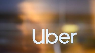 This photograph shows the logo of Uber during the World Economic Forum (WEF) annual meeting in Davos on January 19, 2026. The World Economic Forum takes place in Davos from January 19 to January 23, 2026.
INA FASSBENDER / AFP