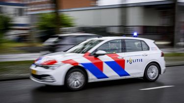 ILLUSTRATIEF - Een politieauto. ANP EMIEL MUIJDERMAN