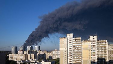 This photograph shows smoke rising following a Russian air attack in Kyiv on August 29, 2026, amid the Russian invasion of Ukraine.  A Russian drone strike triggered a major fire and explosions at a warehouse on the outskirts of Ukraine's capital Kyiv, forcing hundreds to evacuate the region, authorities said early on August 29.
Serhii Okunev / AFP