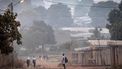 Pedestrians walk in in Korhogo on January 15, 2024. 
FADEL SENNA / AFP