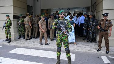 Security personnel stand guard outside Colombo High Court after escorting the accused involved in Sri Lanka's Easter Sunday attacks of 2019, during the verdict in the trial in Colombo on September 22, 2026. Sri Lanka is set to conclude on September 22 the trial of 24 men accused of plotting the 2019 Easter Sunday bombings, the deadliest attack against civilians in the island's history. Suicide bombers struck three luxury hotels and three churches on April 21, 2019, killing 279 people, including 45 foreigners.
Ishara S. KODIKARA / AFP