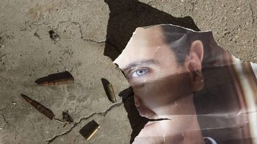 epaselect epa11781521 A portrait of the former Syrian president Bashar al-Assad on the ground at the Mezzeh Air Base on the outskirts of Damascus, Syria, 16 December 2024. After Syrian rebels ousted President Bashar al-Assad on 08 December 2024, the Israeli military carried out strikes throughout Syria to destroy what remained of the Assad regime's military arsenal.  EPA/ANTONIO PEDRO SANTOS