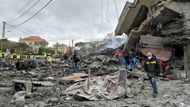 First aid responders are seen at the site of an Israeli airstrike that targeted the southern Lebanese village of Kfar Roummane on March 26, 2026. Israel, which occupied southern Lebanon for around two decades until 2000, has kept up strikes on its northern neighbour and sent ground troops to take control of a strip up to the Litani River, around 30 kilometres (20 miles) from the border. On February 28, Israel and the United States launched strikes on Iran, killing its supreme leader and triggering a war that spread across the Middle East, with Lebanon's Hezbollah entering the fray on March 2. 

Abbas Fakih / AFP
