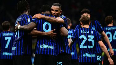 Inter Milan's French forward #9 Marcus Thuram celebrates with teammates after scoring his team's first goal during the Italian Serie A football match between Inter Milan and Parma at San Siro stadium in Milan, on May 3, 2026. 
Marco BERTORELLO / AFP