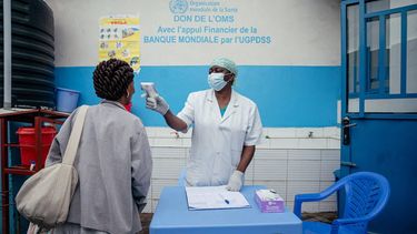 A doctor from CBCA Virunga hospital check a visitor’s temperature at a screening checkpoint set up at the hospital entrance as part of Ebola prevention measures in Goma, on May 21, 2026. An Ebola outbreak in the Democratic Republic of Congo has spread to eastern South Kivu province in an area under the control of the Rwanda-backed M23 militia, the group's spokesman said Thursday, heightening fears of the deadly disease's growing reach.
Efforts to get a grip on the latest outbreak of the highly contagious haemorrhagic fever, which the World Health Organization has declared an international emergency, have been hampered by the DRC's long-running conflicts, including between the Congolese army and the M23. Having seized swathes of land in the mineral-rich east with Rwanda's help, the M23 has installed a parallel administration to the Congolese government in areas under its control.
Jospin Mwisha / AFP