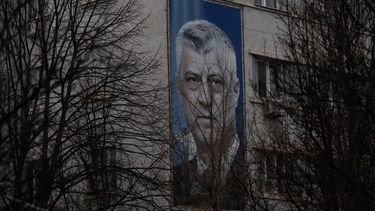 A giant banner depicting former Kosovo president Hashim Thaci is pictured in Pristina on February 6, 2026. In Kosovo, where former guerrilla leaders are still celebrated as heroes, the war crimes trial of ex-president Hashim Thaci and other senior commanders has reignited bitter debate over the legacy of the independence struggle. The trial in The Hague, which hears closing statements this week, involves former President Hashim Thaci and three other men who were senior figures in the Kosovo Liberation Army (KLA) during the 1990s war against Serbia
Armend NIMANI / AFP