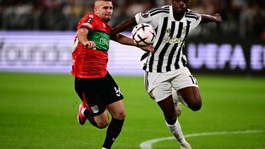NEC Nijmegen’s Dutch forward #30 Bryan Linssen (L) fights for the ball with Juventus’ French defender #15 Pierre Kalulu during the UEFA Europa League 1st round day 1 football match between Juventus and NEC Nijmegen at the Allianz Stadium in Turin on September 17, 2026. 
Marco Bertorello / AFP