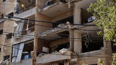epa13022472 Rescuers work at the site of an Israeli airstrike targeting an apartment in the southern suburbs of Beirut, Lebanon, 07 June 2026. At least two people were killed and a dozen injured in an Israeli strike on southern Beirut's suburbs, according to the Lebanese official news agency (NNA).  EPA/ABBAS SALMAN