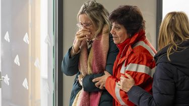 epa12660132 Relatives of victims arrive seeking information about the derailment at Huelva train station in Huelva, Spain, 19 January 2026. At least 20 people were killed and several were injured, with others trapped, according to the Andalusian 112 Emergency Service, after the derailment of two high-speed trains in the municipality of Adamuz in Cordoba.  EPA/ALBERTO DIAZ
