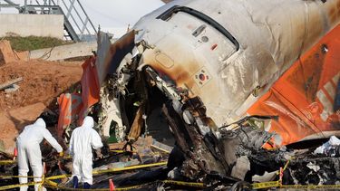 Officials take part in an investigation at the site where a Jeju Air Boeing 737-800 aircraft crashed and burst into flames at Muan International Airport in Muan, some 288 kilometres southwest of Seoul on January 1, 2025. The Boeing 737-800 was carrying 181 people from Thailand to South Korea when it crashed on arrival on December 29, killing everyone aboard -- save two flight attendants pulled from the twisted wreckage of the worst aviation disaster on South Korean soil.
YONHAP / AFP